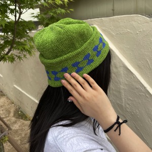 green beanie cap